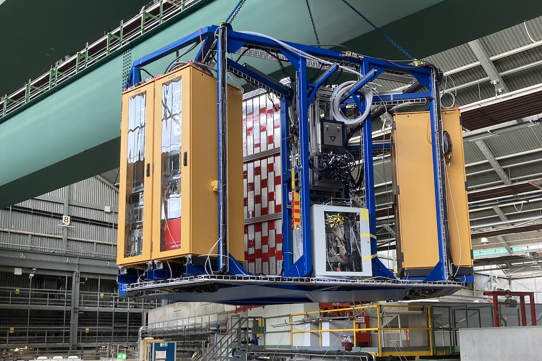 Crane holds up machinery in lab